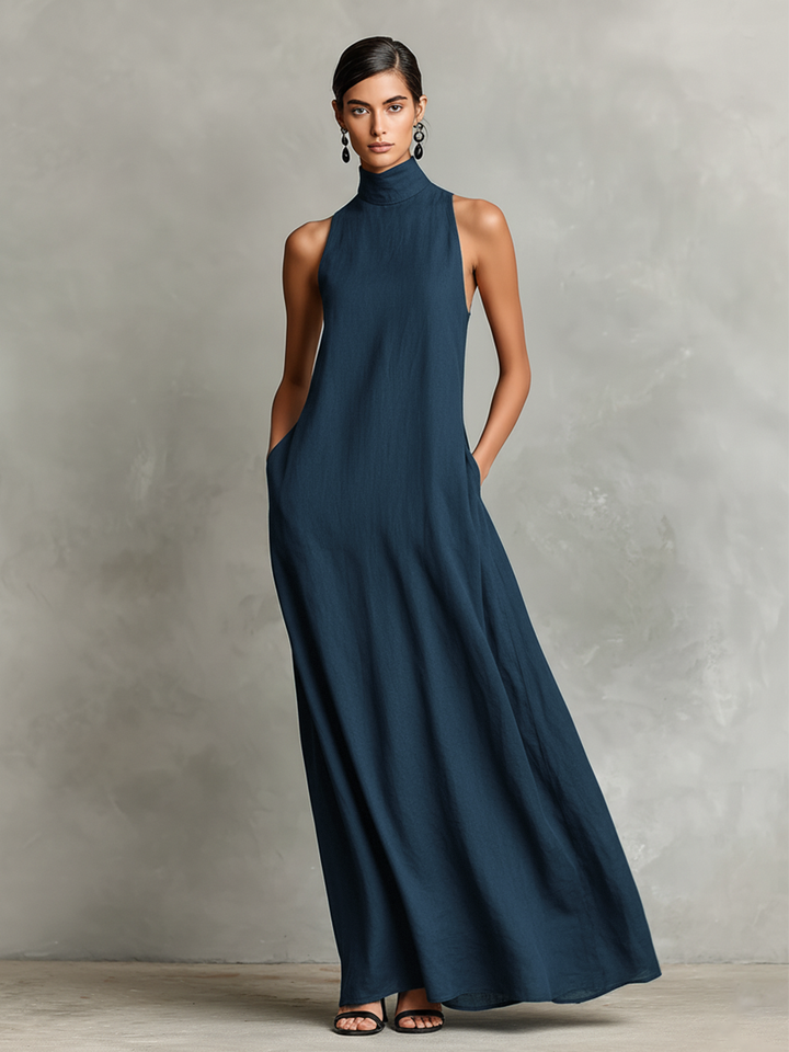 Chiara Bennett and Lowe high-neck flowing maxi dress in soft fabric, full-length design with elegant drape and long sleeves.