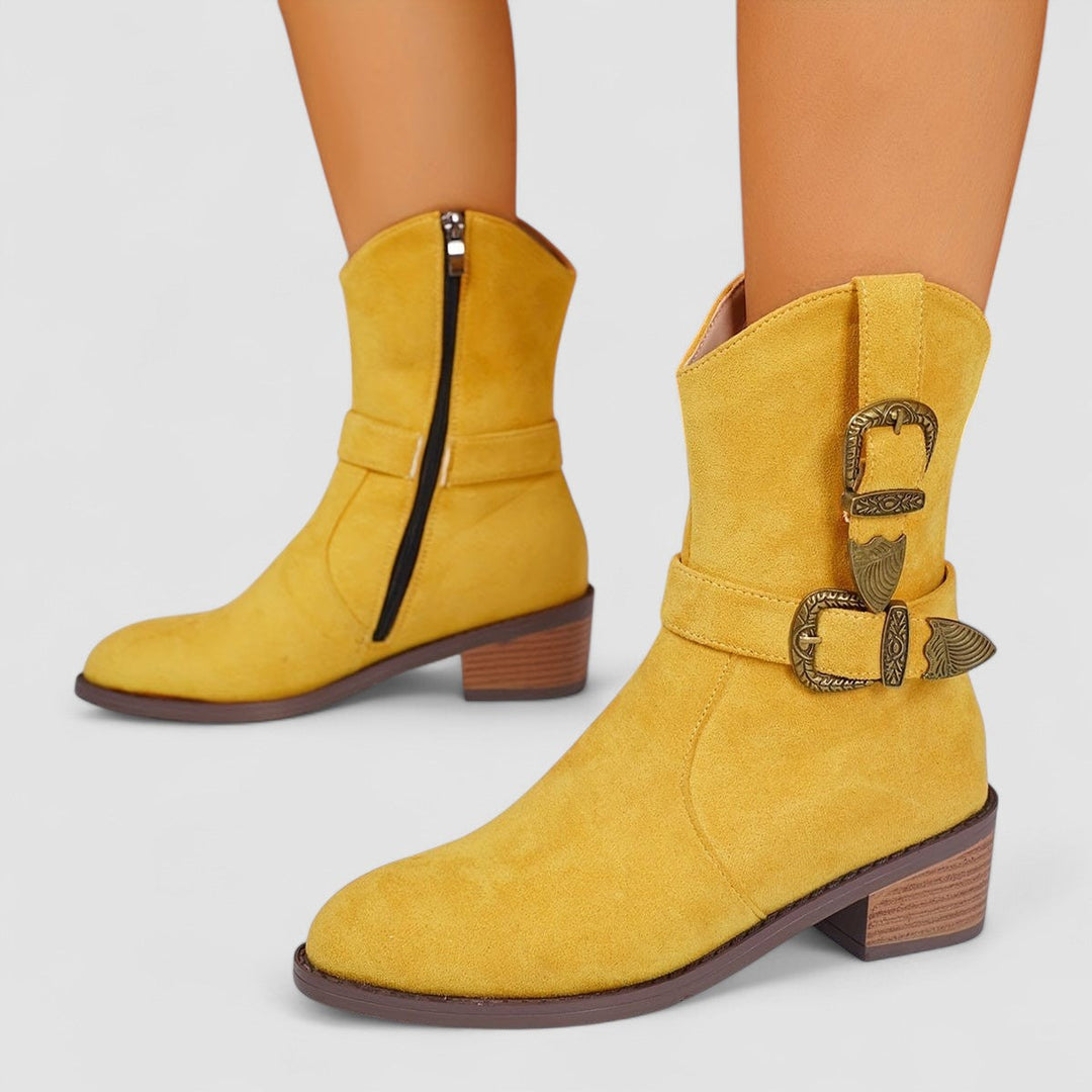 Rosa suede ankle boot for women by Bennett and Lowe featuring a buckle strap and stylish design.