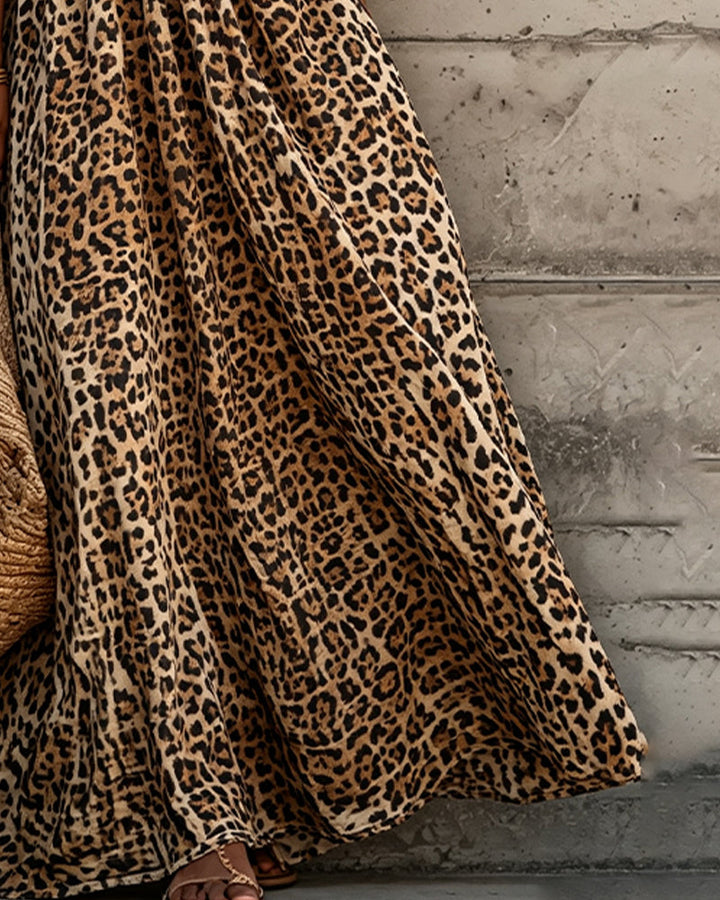 Leopard print V-neck maxi dress for women by Bennett and Lowe, featuring a flowing silhouette and bold animal print.