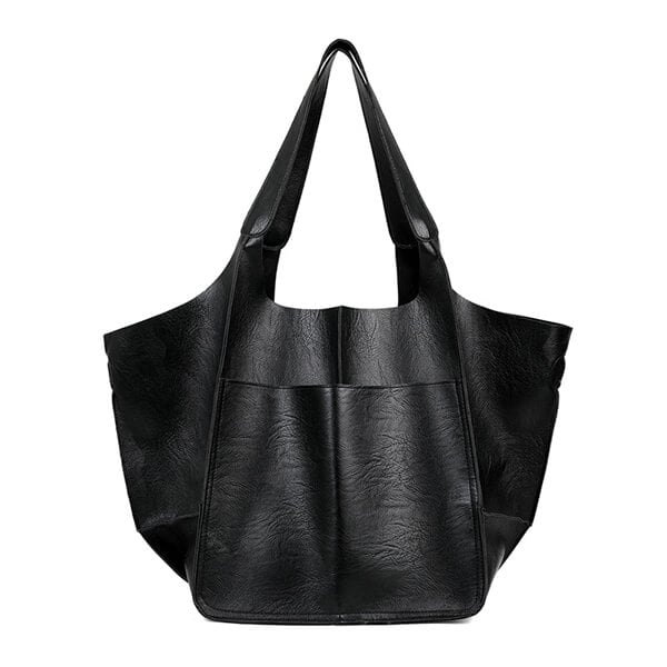 Bennett and Lowe Ruth pebble leather tote bag with adjustable strap, showing its textured leather surface and spacious interior.