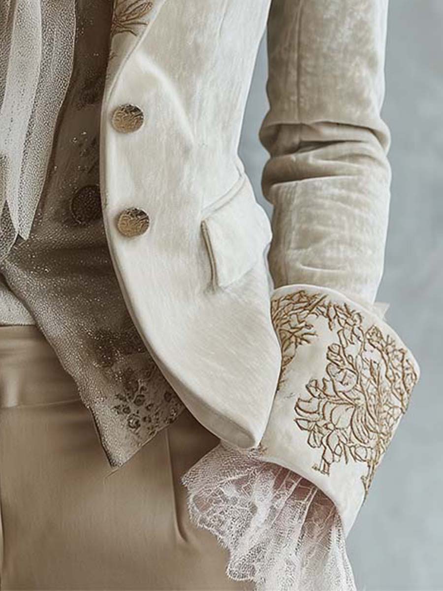 Darlene Bennett and Lowe embroidered tailored long sleeve blazer in navy with floral embroidery on the front and lapels.