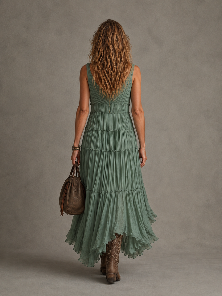 Ava gathered V-neck maxi dress by Bennett and Lowe featuring a flowing silhouette and elegant neckline in a natural setting.