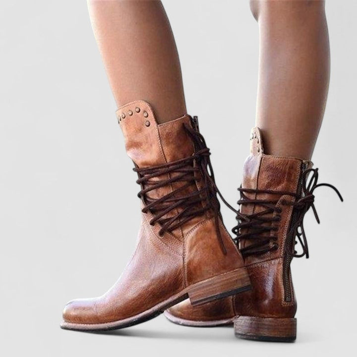 Bennett and Lowe Mae lace-up ankle boot for women, featuring black leather, round toe, and durable sole on a white background.