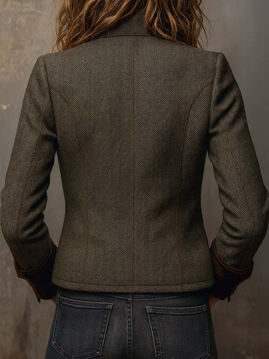 Barbara herringbone contrast-trim blazer jacket by Bennett and Lowe, featuring tailored fit and stylish design, shown on a hanger.