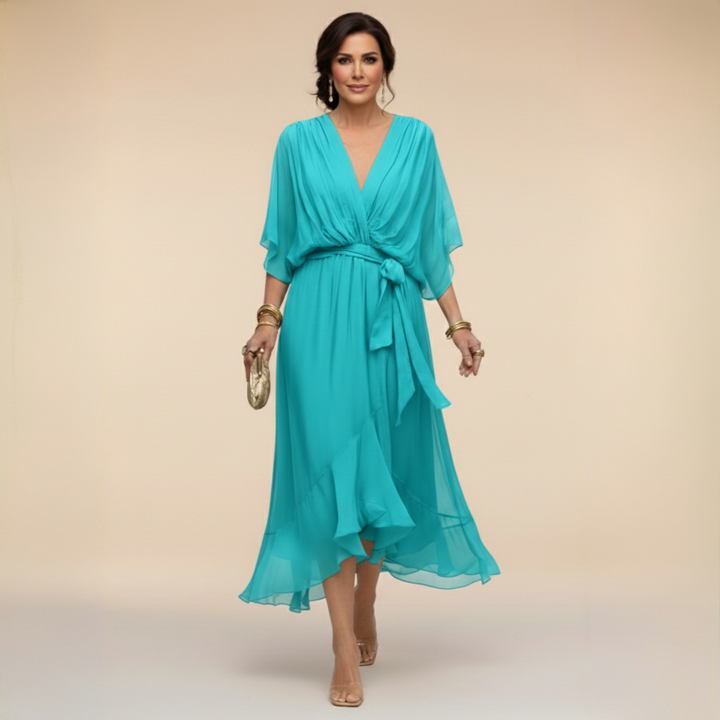 Clara wrap V-neck dress by Bennett and Lowe, featuring a stylish V-neckline and elegant design, shown on a model.