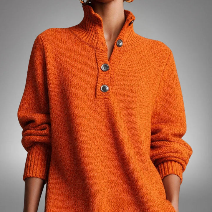 Bethany Bennett and Lowe button-collar midi dress in a flowy fabric, shown on a model with a fitted waist and short sleeves.