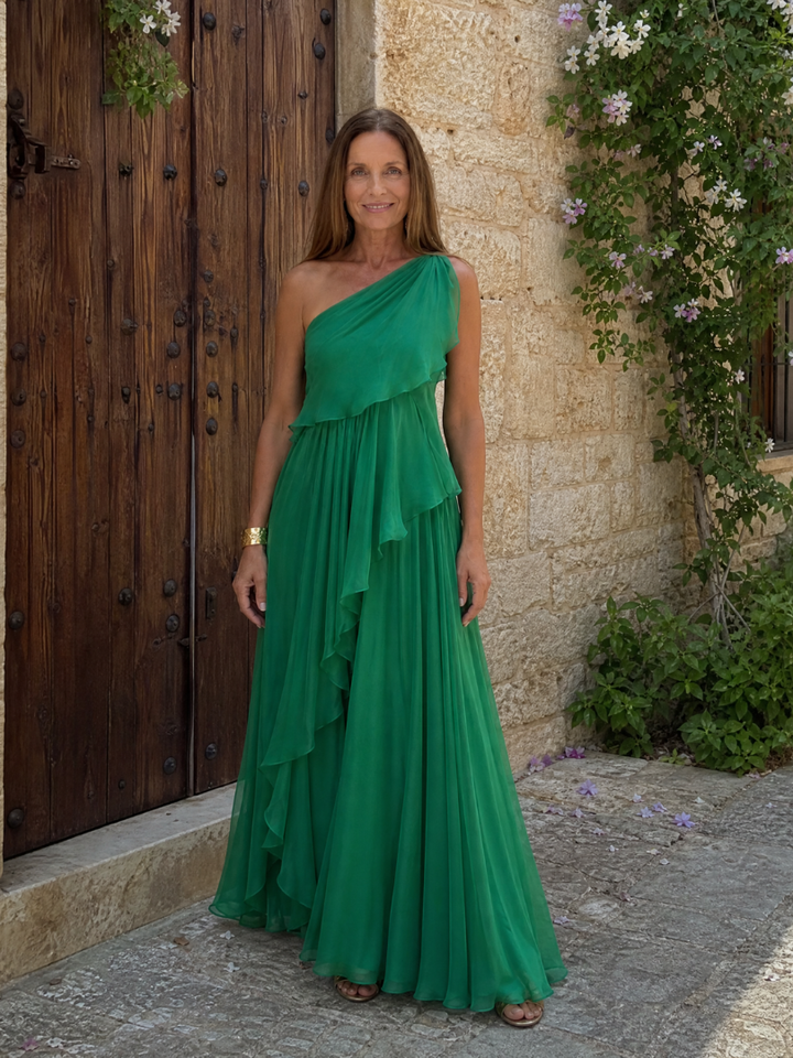 Tracey Bennett and Lowe one-shoulder ruffle maxi dress shown on a model with flowing fabric and elegant design.