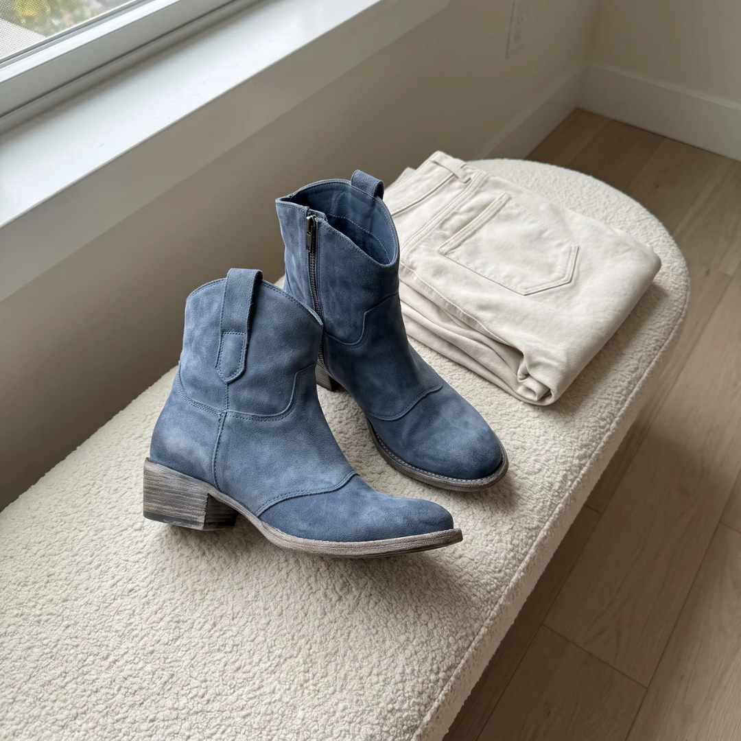 Charlotte Bennett and Lowe comfort suede ankle boots with a sleek design and low heel, perfect for casual or dressy outfits.