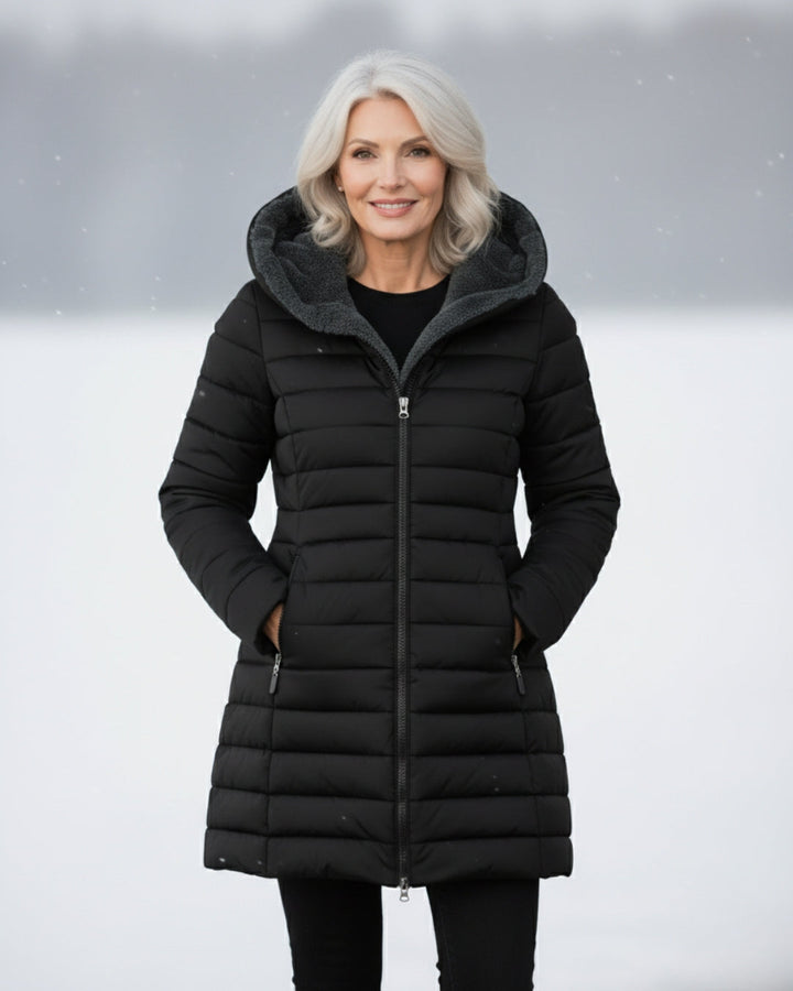 Bennett and Lowe Marguerite hooded quilted winter jacket with front zipper and cozy hood, suitable for cold weather.