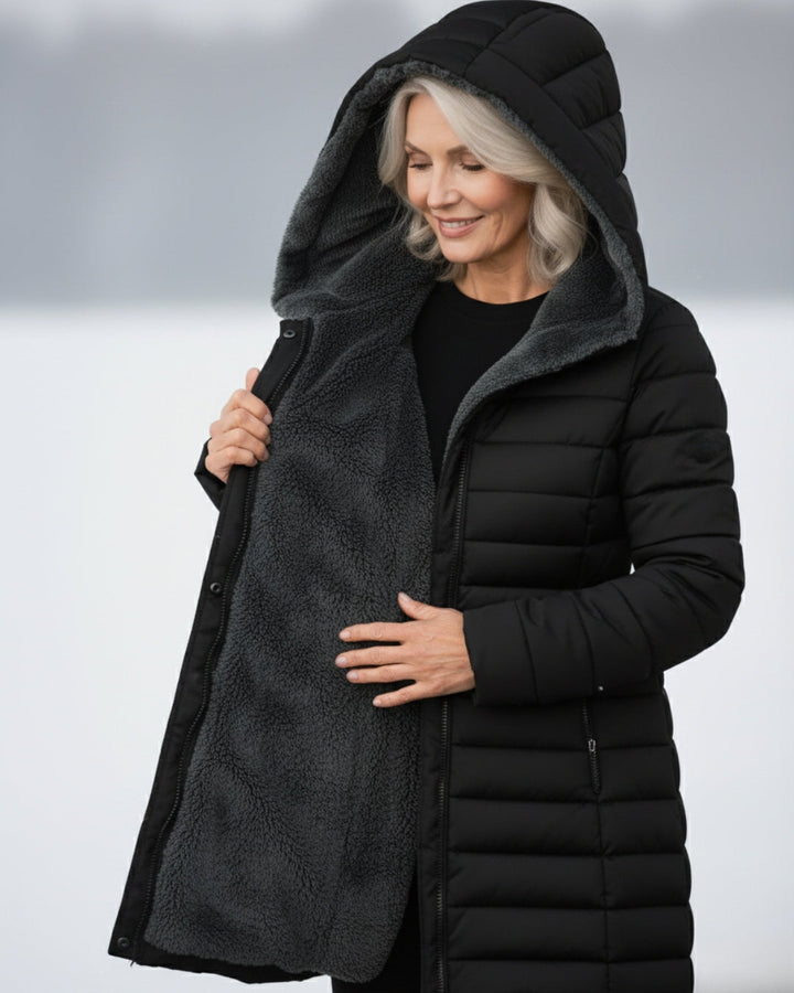 Bennett and Lowe Marguerite hooded quilted winter jacket with insulated design and cozy hood, suitable for cold weather.