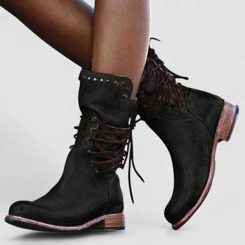 Bennett and Lowe Mae lace-up ankle boots for women, showcasing black leather with ankle-high design and sturdy heel.