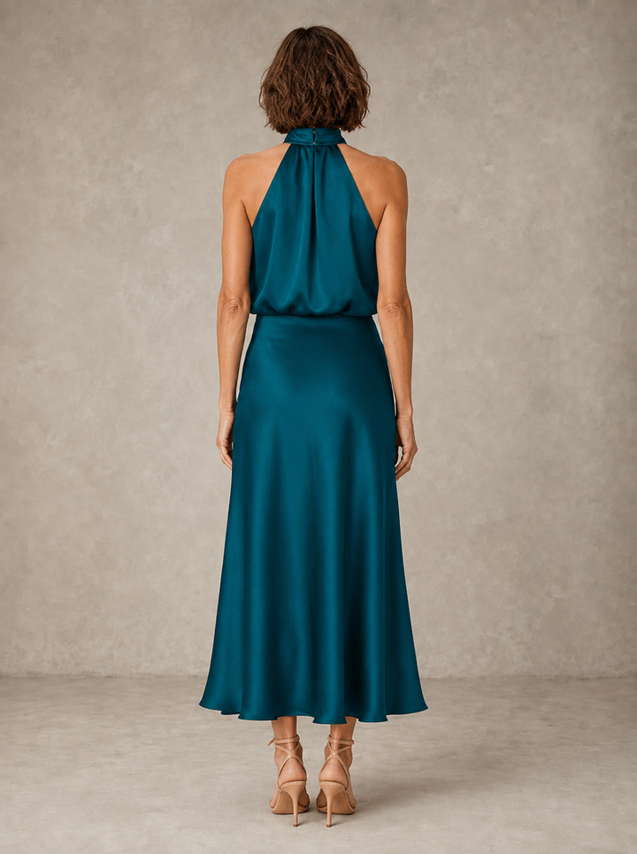Violet & Grace Harper halter satin evening dress, elegant black gown with a flowing silhouette and stylish halter neckline.
