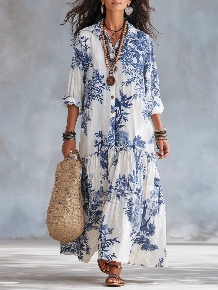 Blue floral button-down maxi dress for women by Bennett and Lowe, featuring a flowing design and vibrant floral pattern.