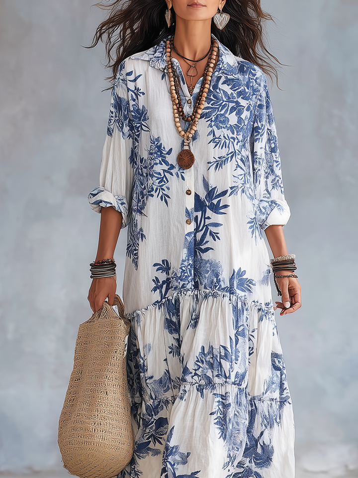 Blue floral button-down maxi dress for women by Bennett and Lowe, featuring a flowing silhouette and vibrant floral pattern.