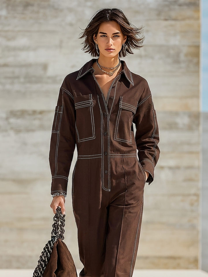 Muriel Bennett and Lowe straight-leg utility jumpsuit for women, featuring a fitted waist, chest pockets, and full-length legs.