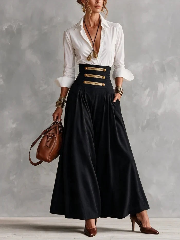 Rosalind collared shirt and button maxi skirt set by Bennett and Lowe, featuring a structured shirt and flowing skirt in neutral tones.
