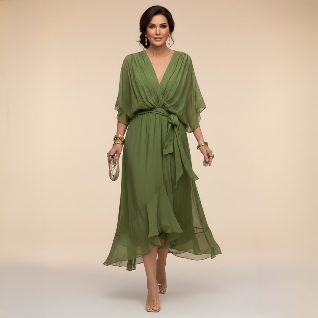 Clara wrap V-neck dress by Bennett and Lowe featuring a fitted waist and elegant drape, in a soft, flowing fabric.