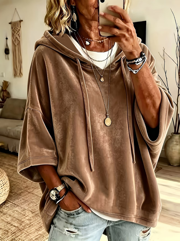 Luana oversized poncho hoodie by Bennett and Lowe, shown in soft fabric with a relaxed fit and hooded design.
