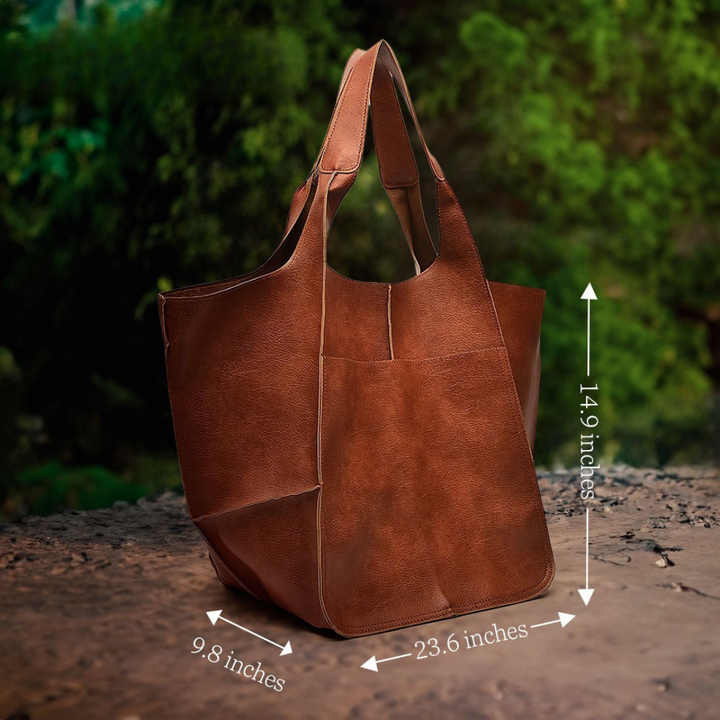 Ruth pebble leather tote bag by Bennett and Lowe with adjustable strap, featuring a stylish and textured leather design.