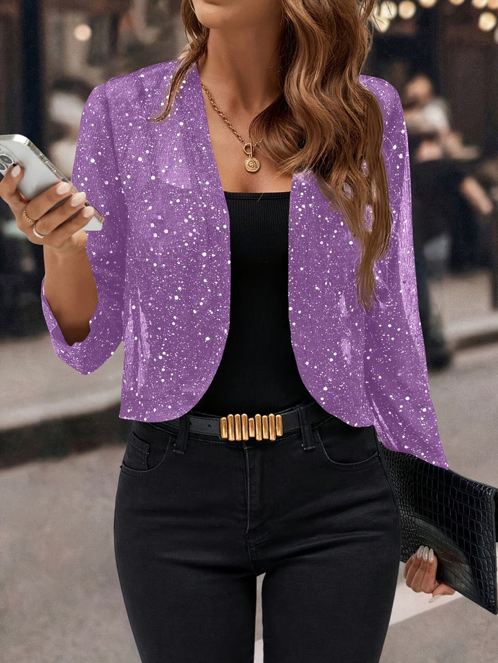 Nerissa open-front sparkle cropped cardigan by Bennett and Lowe layered over a top