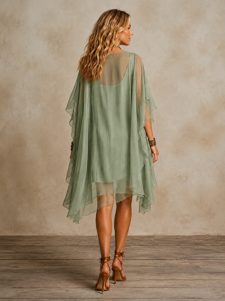 Olivia Newyork Ella tiered boho mini dress with flowy fabric and ruffled layers, perfect for casual or summer wear.
