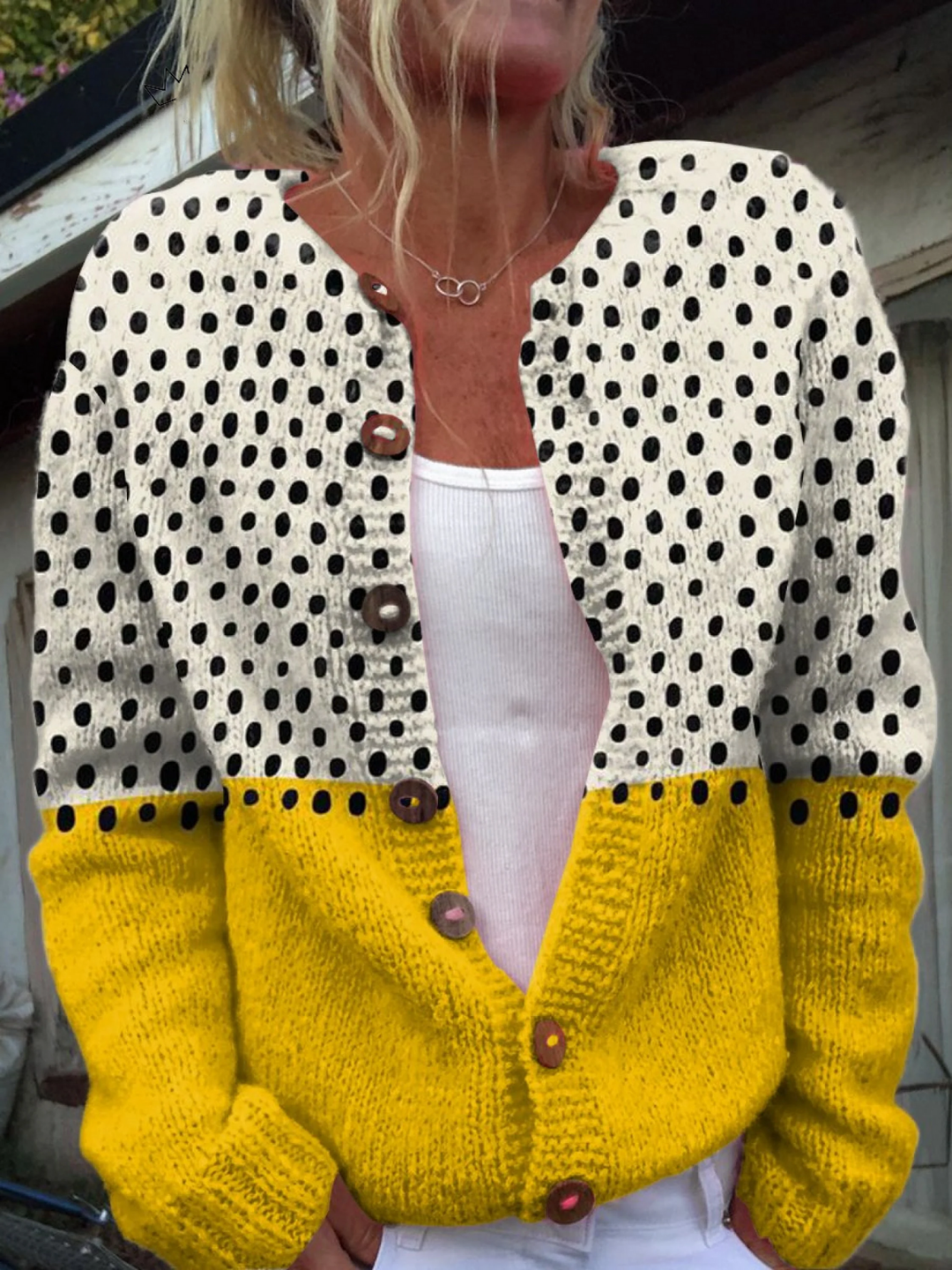 Junella two-tone knit cardigan by Bennett and Lowe, showcasing a stylish layered design and soft fabric in natural colors.