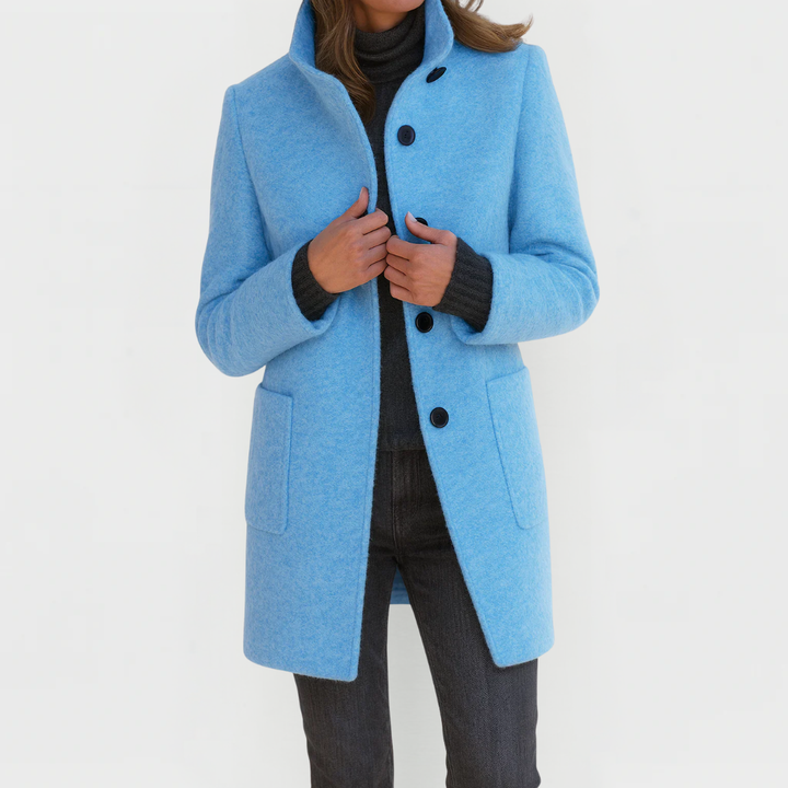 Tailored midi coat for women by Bennett and Lowe, featuring a button-front design and classic silhouette in neutral fabric.