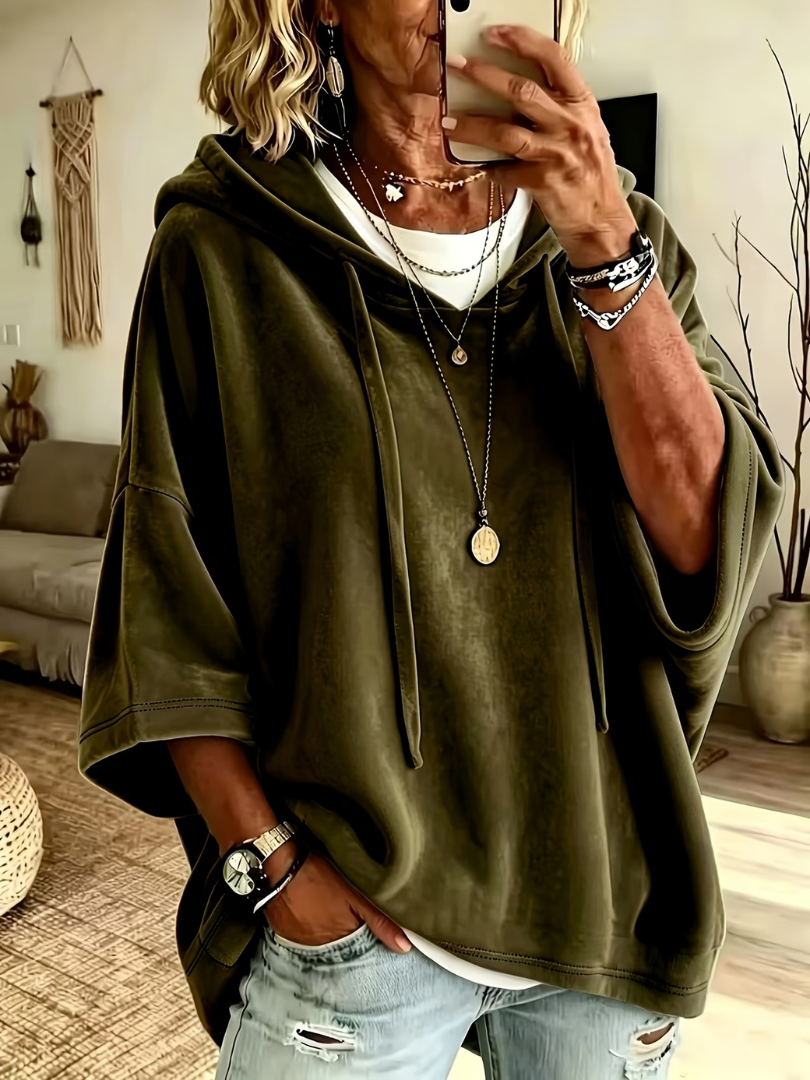 Luana oversized poncho hoodie by Bennett and Lowe showcasing a cozy, stylish gray knit with a relaxed fit and draped design.