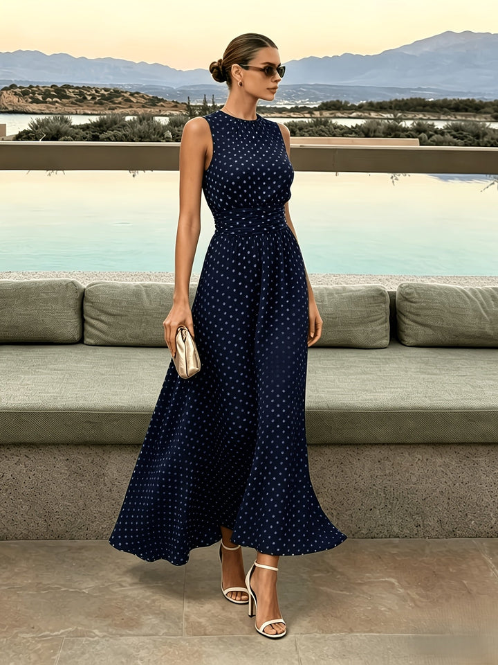 Polka dot maxi dress by Bennett and Lowe featuring a flowing silhouette and vibrant polka dot pattern.
