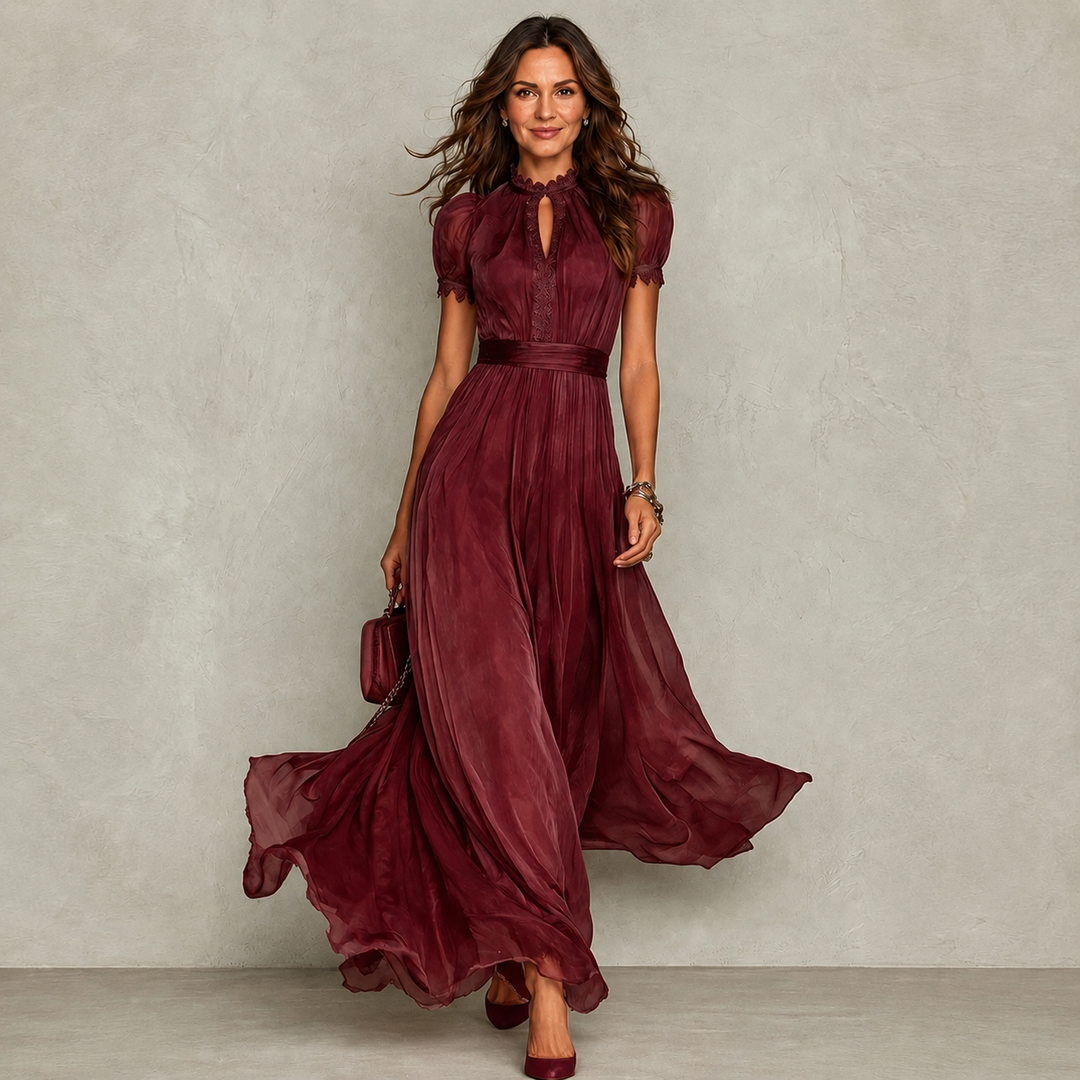Zoey Ruffle Neck Pleated Dress by Bennett and Lowe, featuring a flowy silhouette, ruffle neckline, and elegant pleats.