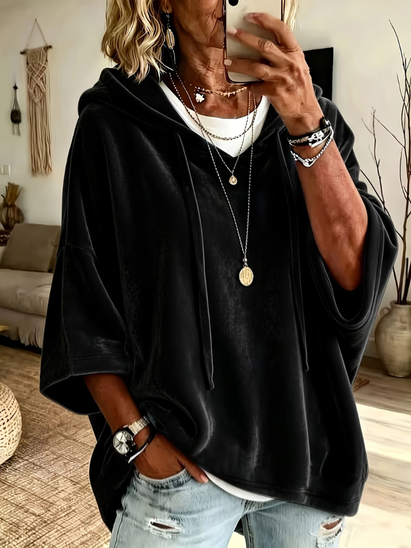 Luana oversized poncho hoodie by Bennett and Lowe, featuring a cozy, draped design in soft fabric with a hood and relaxed fit.
