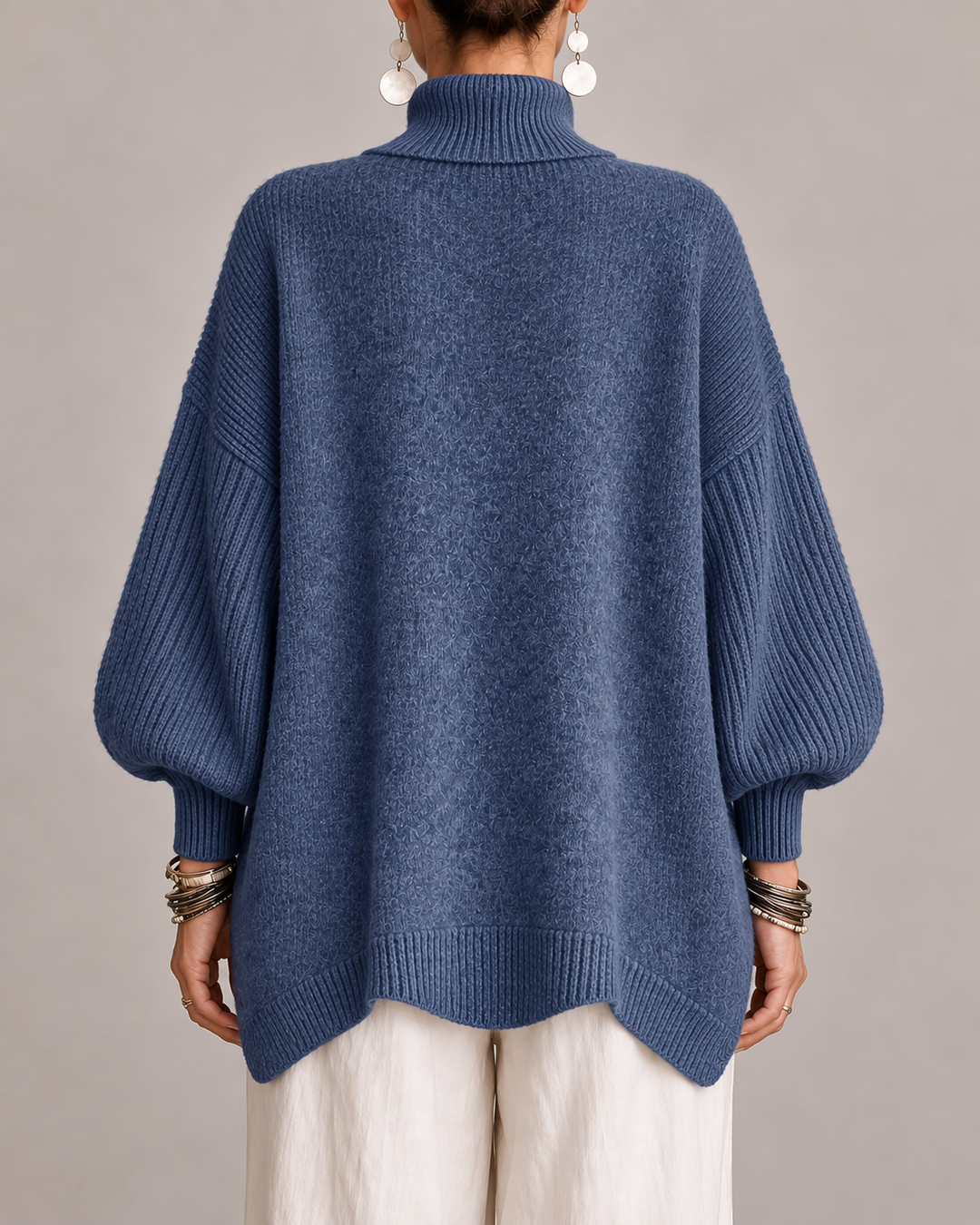 Relaxed fit Danielle sweater by Bennett & Lowe featuring draped design and soft knit fabric, shown in a neutral color.