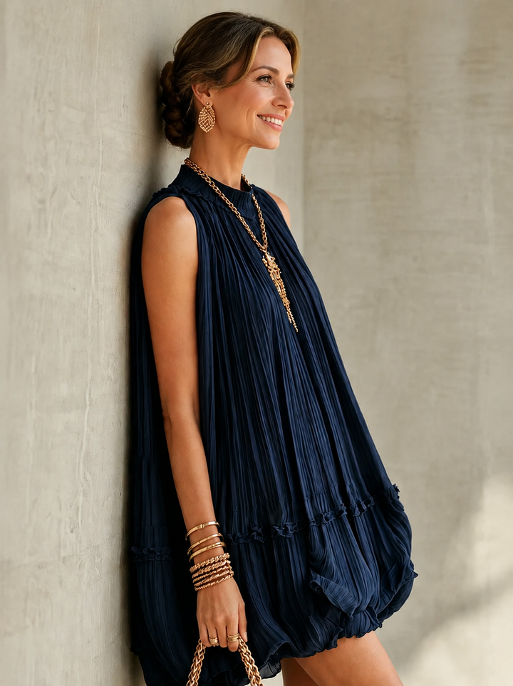 Bennett and Lowe Camilla chiffon halter mini dress featuring a flowy silhouette and elegant neckline, shown on a mannequin.