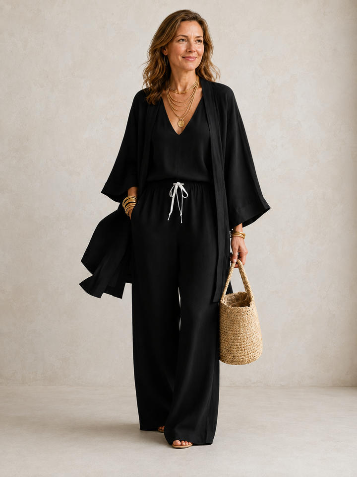 Three-piece linen look set by Bennett and Lowe featuring a top, bottoms, and matching accessories in soft, breathable fabric.