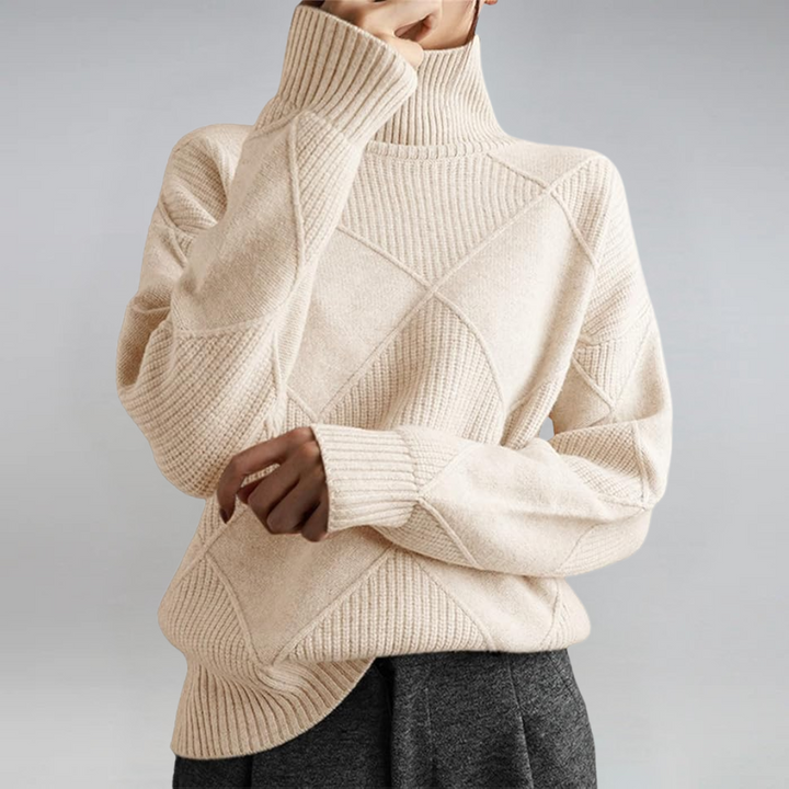 Bennett and Lowe Lauren long-sleeve knit turtleneck sweater for women in neutral color, close-up of cozy, textured fabric.