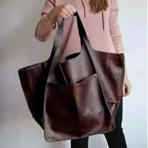 Bennett and Lowe Ruth pebble leather tote bag with adjustable strap, showcasing its textured leather and spacious interior.