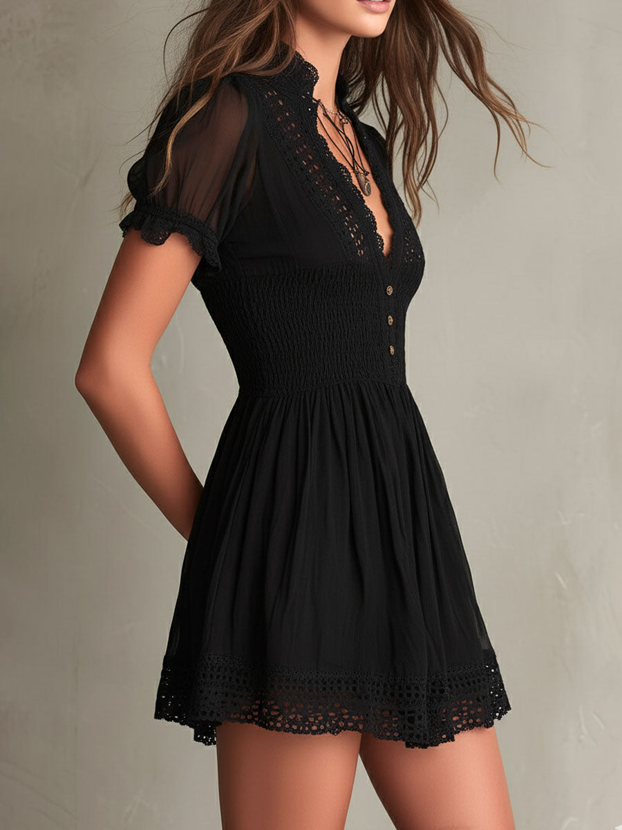 Olivia Newyork Country Muse Adele smocked lace-trim mini dress with ruffled neckline and floral pattern, displayed on a hanger.