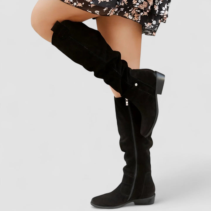 Nora Bennett and Lowe knee-high suede orthopedic boot for women, featuring a sleek design and supportive fit.