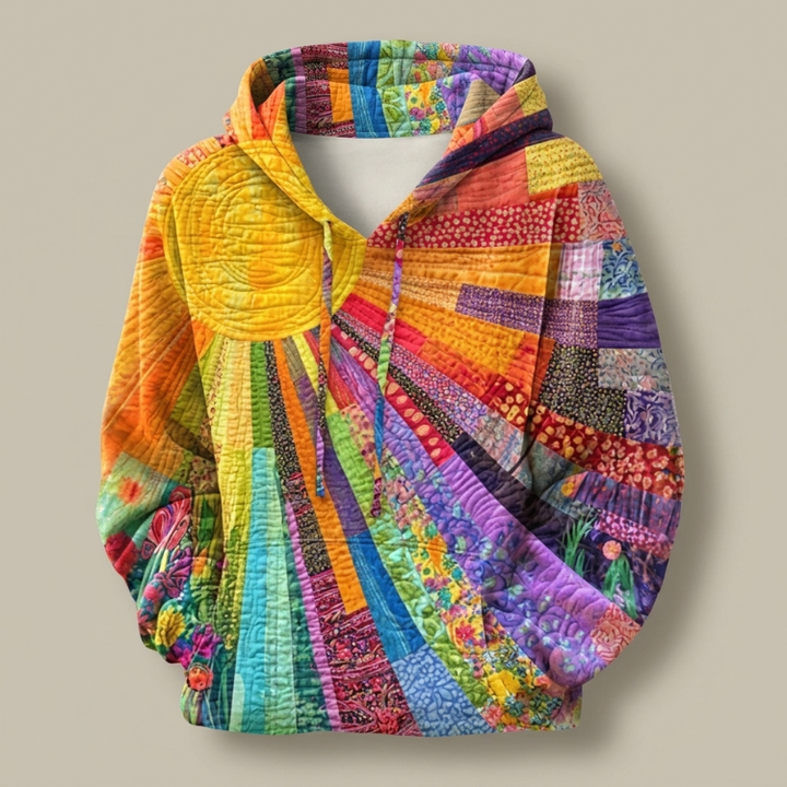 Amanda Wildflower Quilted Hoodie by Bennett and Lowe featuring floral pattern, cozy fit, and quilted fabric in soft pastel tones.