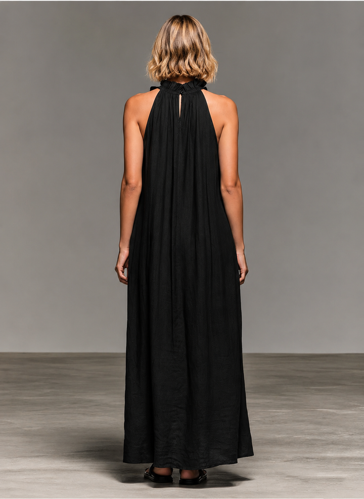 Emma soft ruffle maxi dress by Bennett and Lowe, flowing fabric with ruffle details, full-length dress on a hanger.