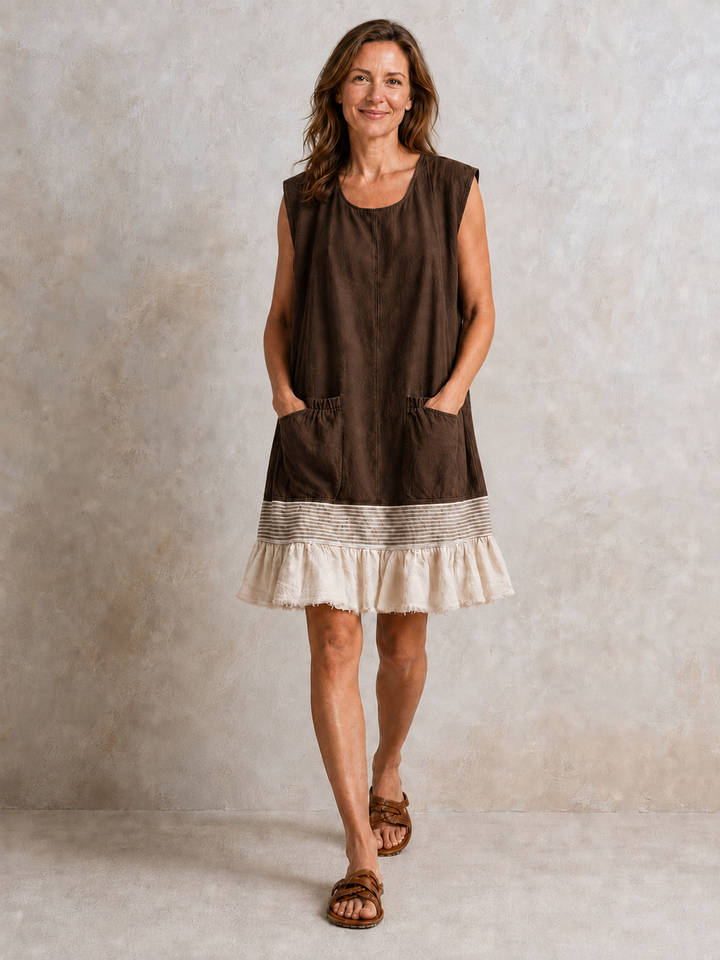 Hazel Bennett and Lowe ruffle hem tunic dress with flowy fabric and stylish design, showcased on a neutral background.