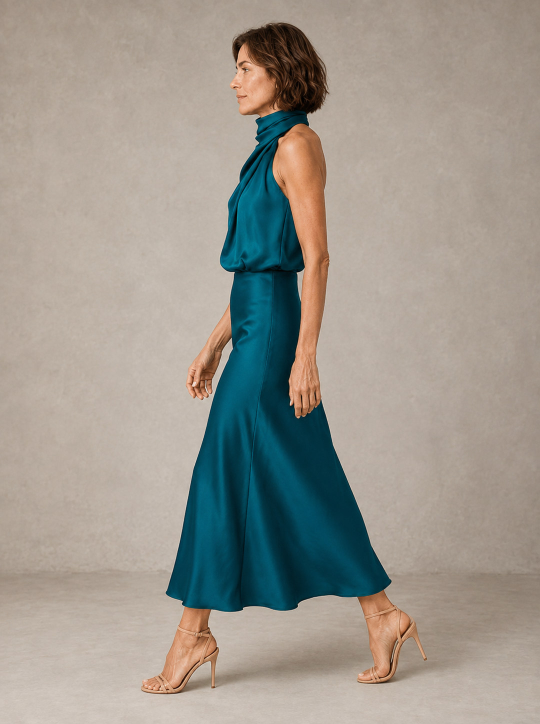 Violet & Grace Harper halter satin evening dress, elegant black dress with flowing fabric and stylish halter neckline.