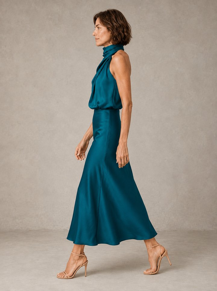 Violet & Grace Harper halter satin evening dress, elegant black dress with flowing fabric and stylish halter neckline.