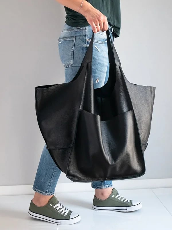 Bennett and Lowe Ruth pebble leather tote bag with adjustable strap, showcasing its textured leather surface and spacious design.