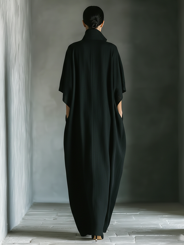 Costanza Bennett and Lowe women's V-neck kimono-sleeve maxi dress, flowing fabric and elegant design, shown on a model.
