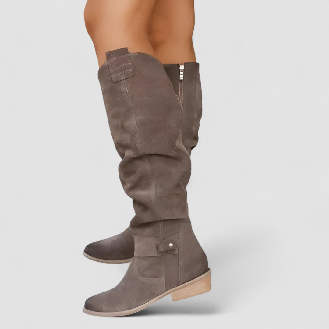 Nora Bennett and Lowe knee-high suede orthopedic boot for women, showcasing the sleek design and soft suede material.
