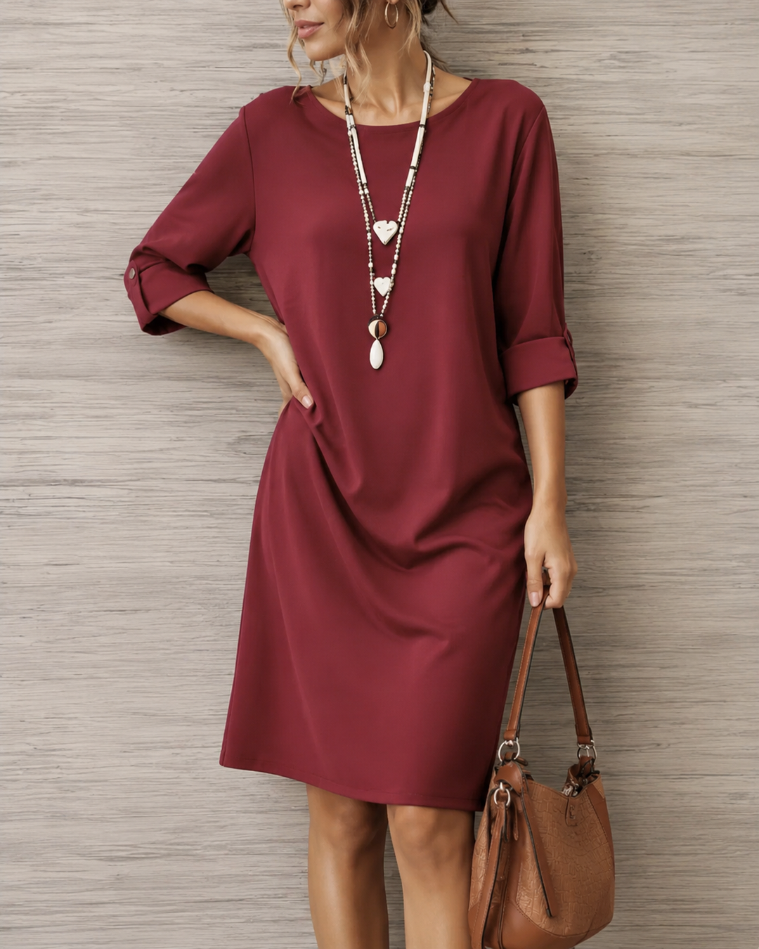 Odette Tummy-Contouring Midi Dress by Bennett and Lowe, featuring a fitted silhouette and elegant design, shown on a model.