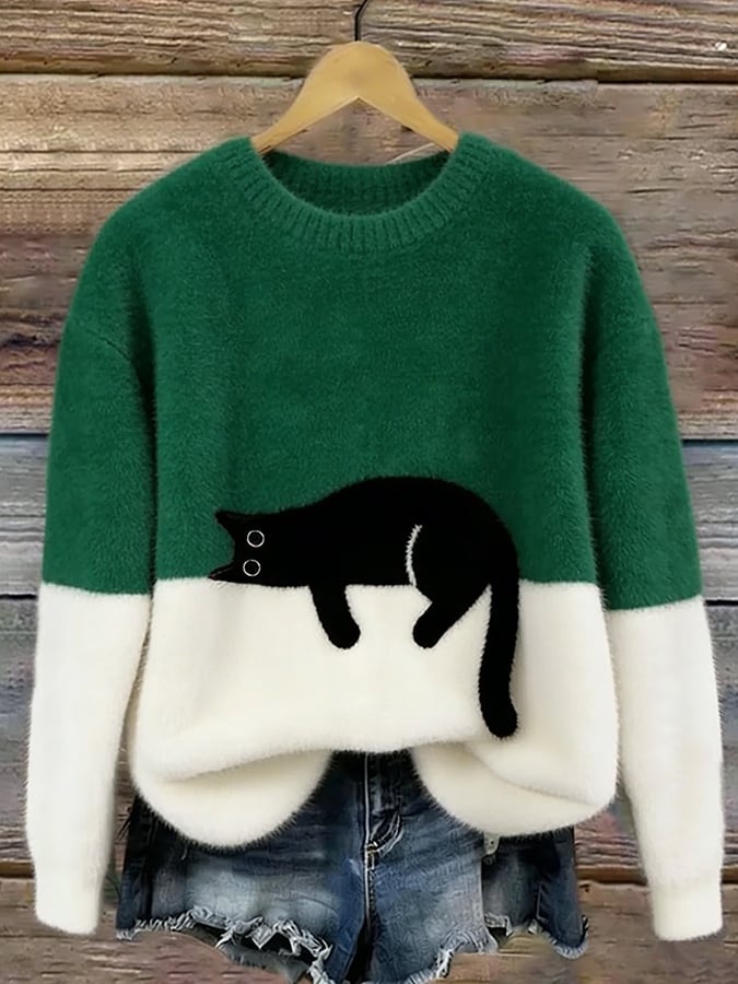 Aileen Bennett and Lowe women's oversized sweater with a colorful cat print, featuring a cozy, relaxed fit.