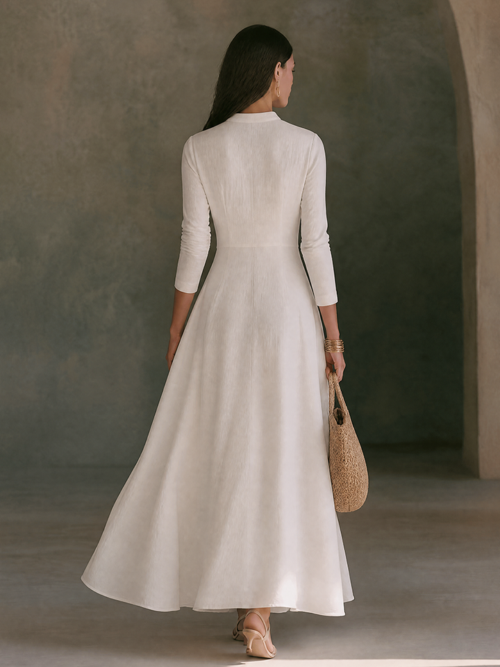 Linen A-Line maxi dress for women by Bennett and Lowe, featuring a flowing silhouette and elegant design in a natural fabric.