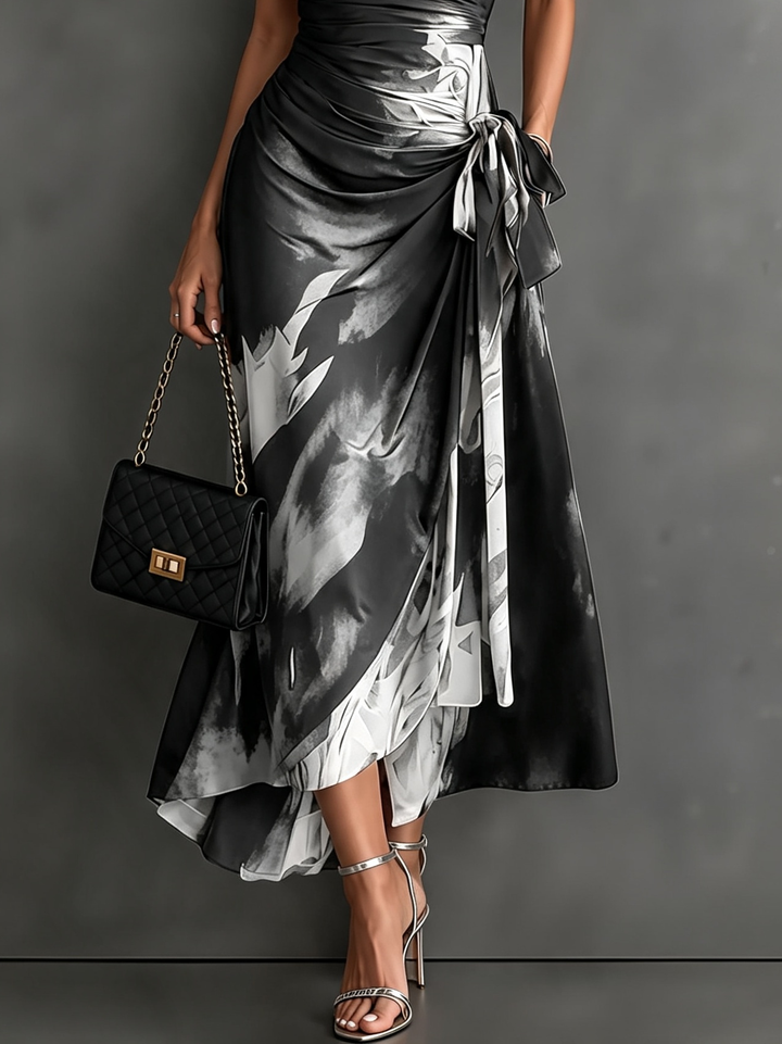 Black and white abstract print midi wrap dress from Bennett & Lowe, featuring a stylish and elegant design.